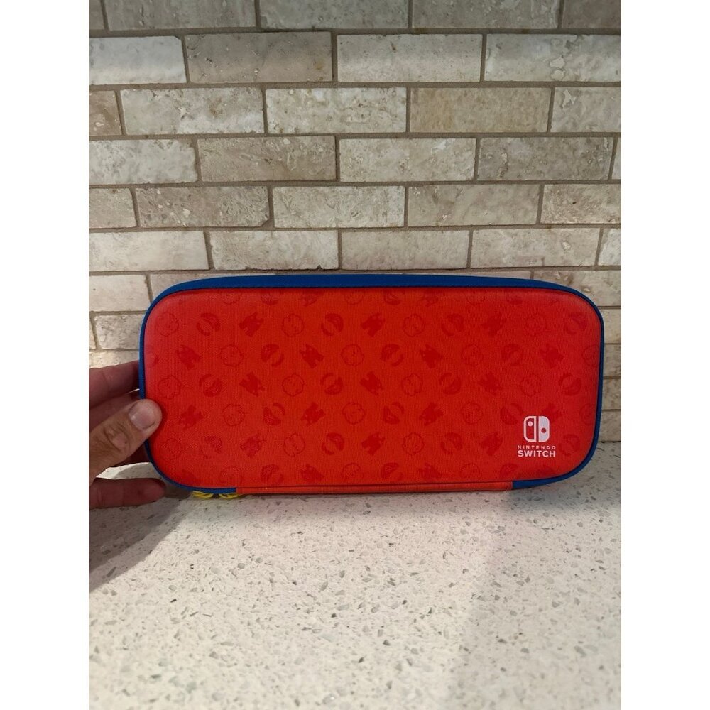 carrying case for the Nintendo Switch‎ Mario Red & Blue Edition.